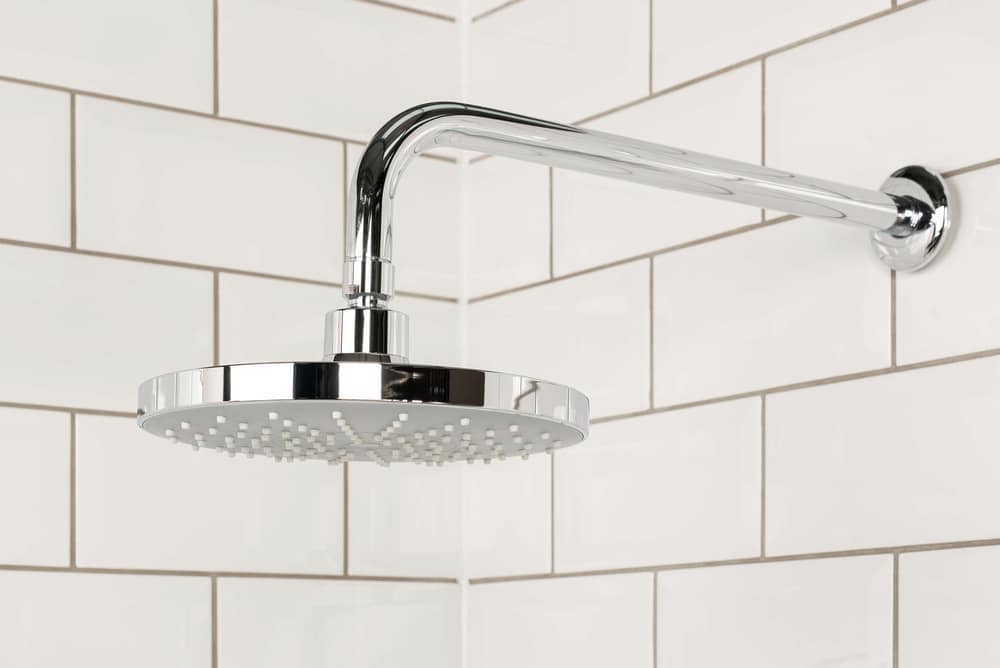 Steel shower head detail for a safer shower remodel