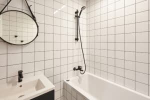 Safe walk-in shower with tiled walls and modern fixtures