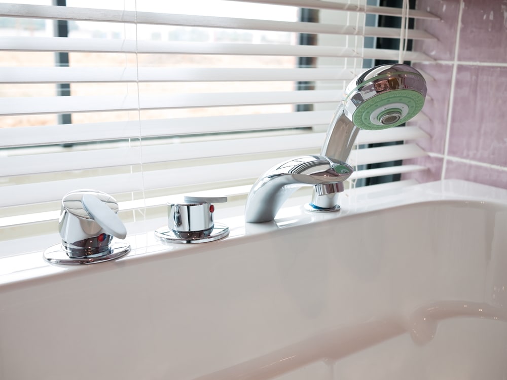 Shower head and tap detail for safety-focused bathroom remodeling