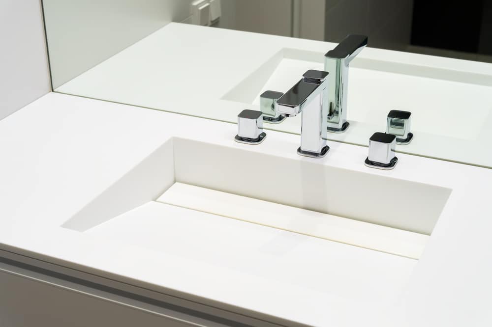 Chrome bathroom taps on a washbasin